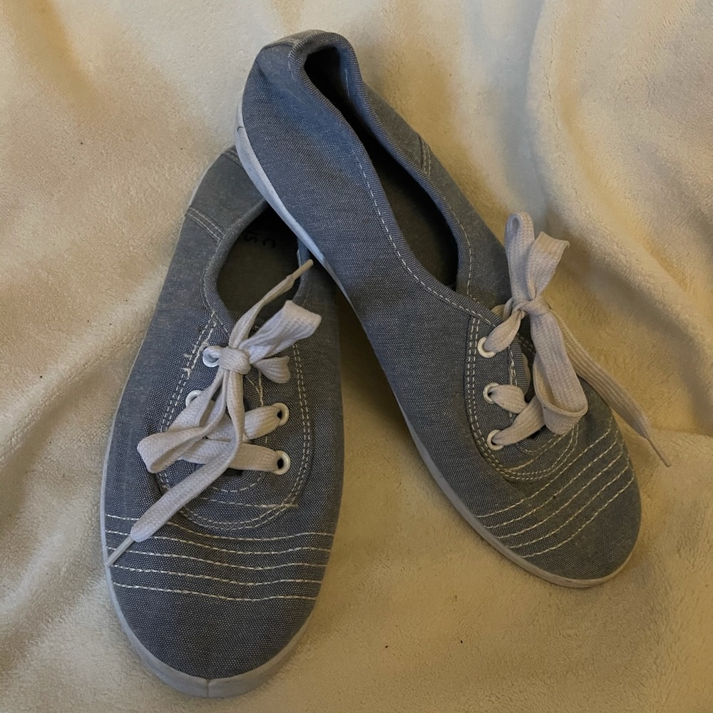 A light blue Jean pair of sneakers